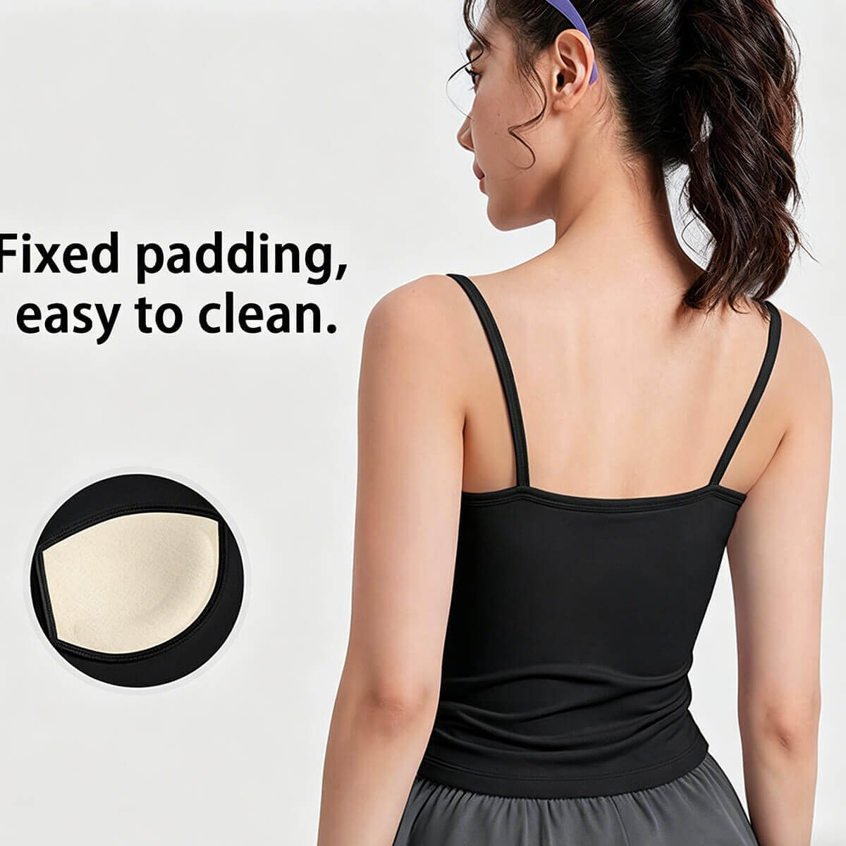 Back view of a black sports tank top with an infographic highlighting the built-in fixed padding that is stay-put and laundry-friendly