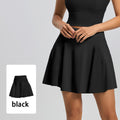 Classic black high-waisted pickleball skort with a flared pleated hem, perfect for sports and casual summer style.