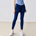 Front view of blue 2-in-1 sports leggings featuring loose outer shorts over slim-fit inner tights for running and gym