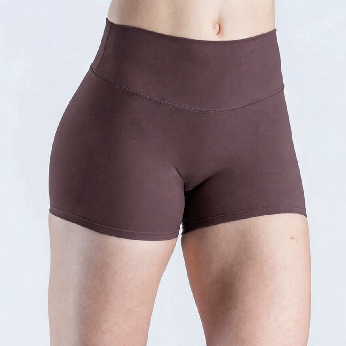 Close-up of espresso brown buttery-soft workout shorts for women, showing a seamless-feel finish.