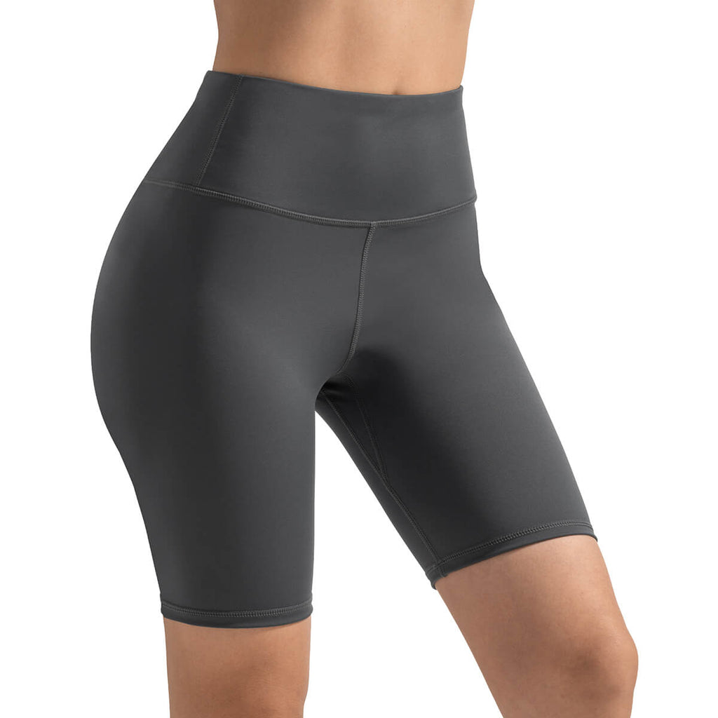 Deep charcoal grey high-rise athletic biker shorts for women, featuring a supportive waistband for gym workouts and running.