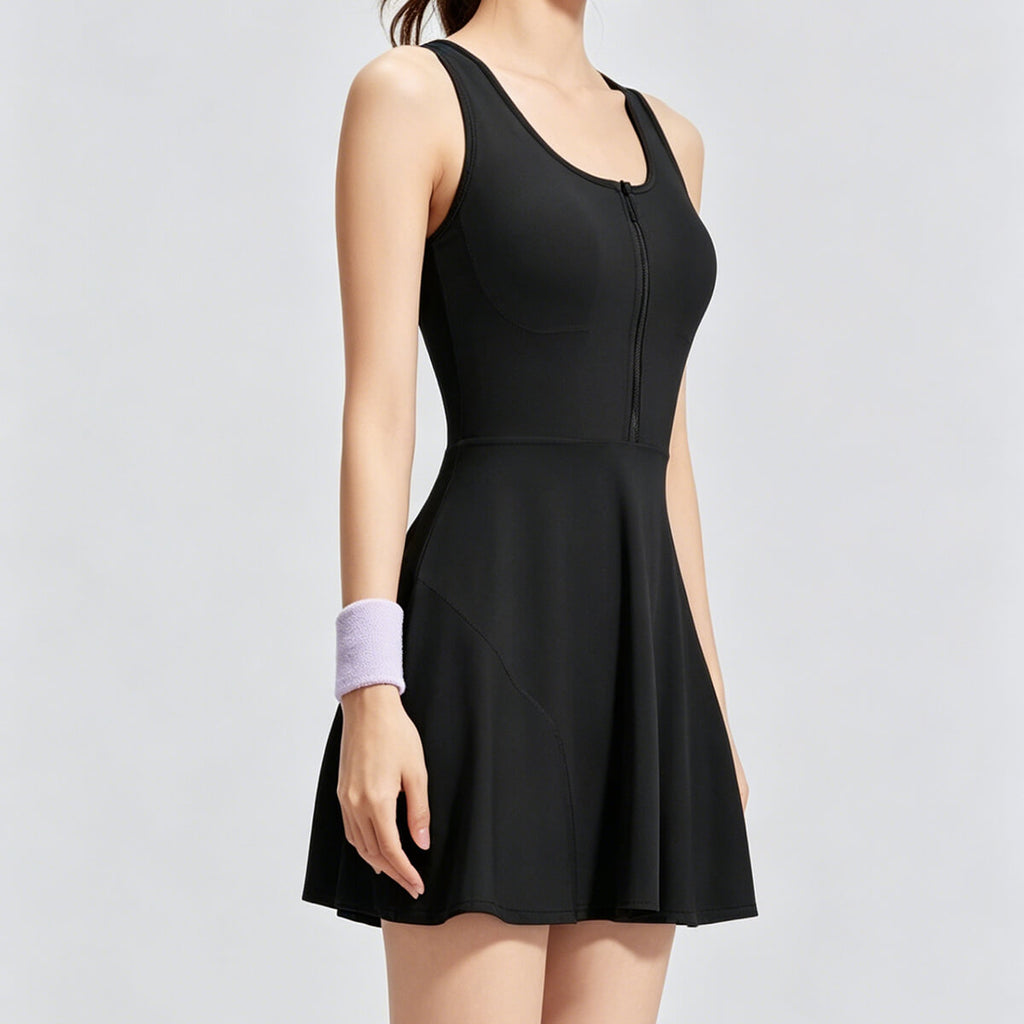 A classic black women's athletic dress with a functional front zipper and built-in liners for sports