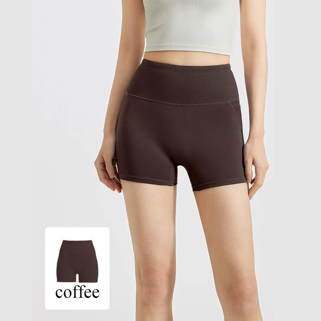 Dark coffee brown athletic shorts for women featuring a high-waisted ribbed design and soft moisture-wicking material.