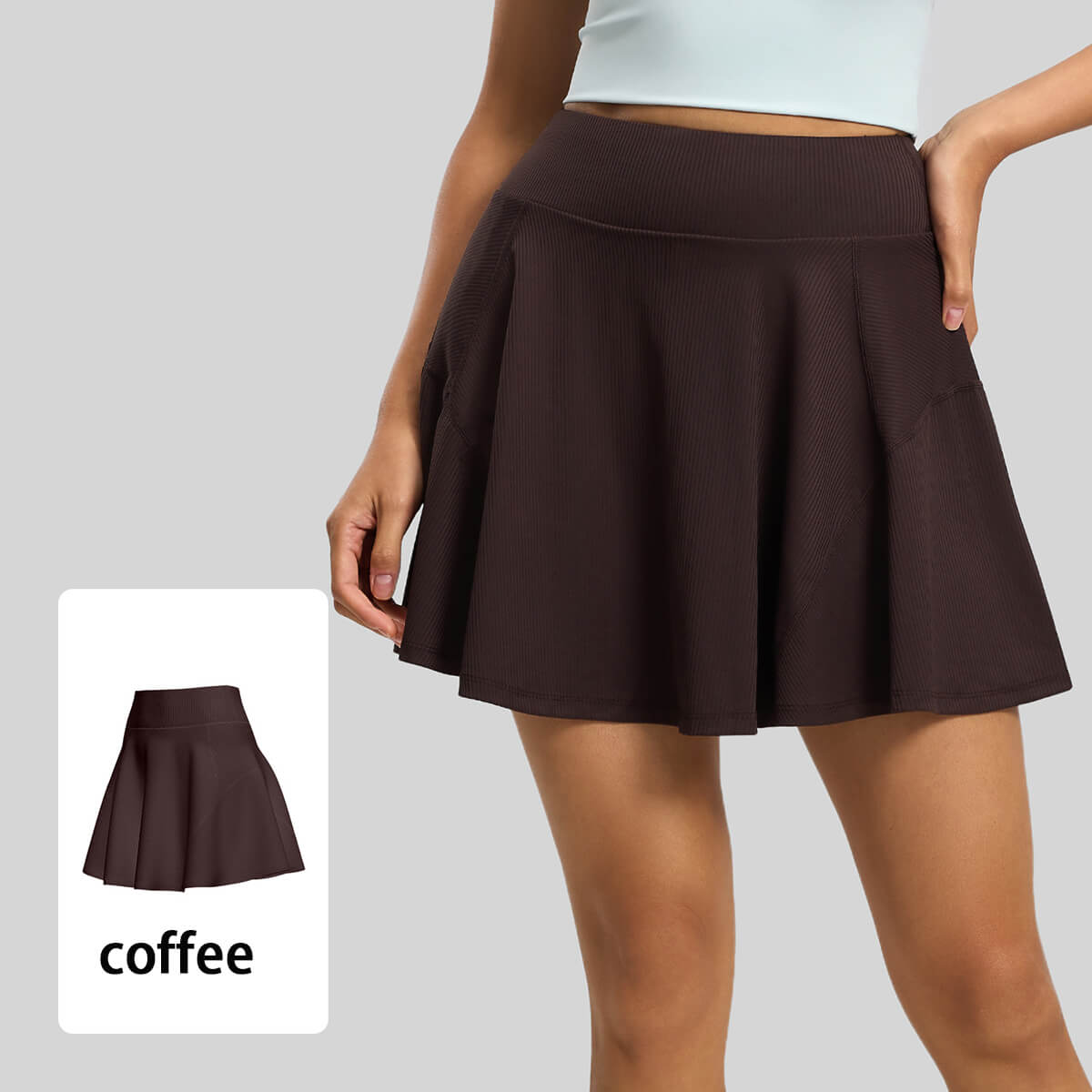 Coffee brown pleated workout skort for women, stylish A-line athletic skirt designed for outdoor activities.