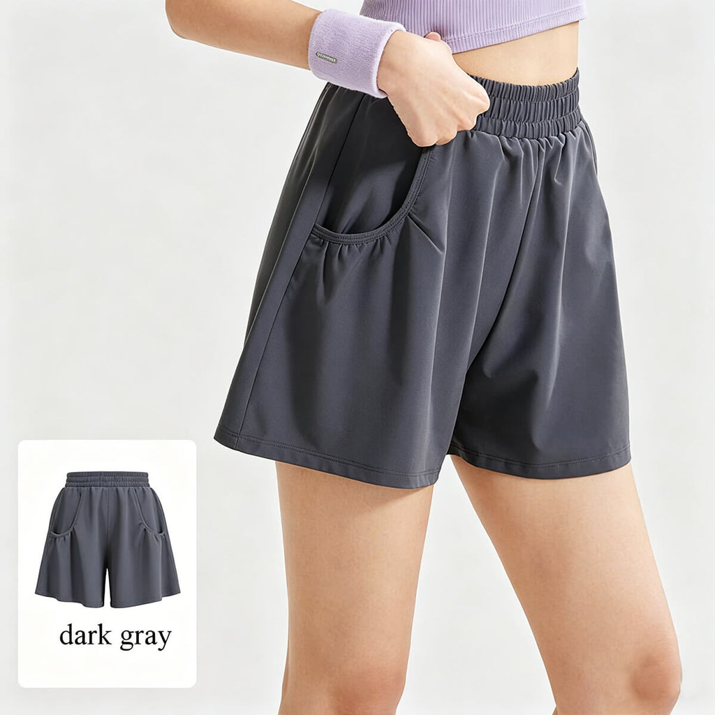 Dark gray loose-fit athletic gym shorts for women, a versatile charcoal workout short perfect for running, tennis, or casual wear.