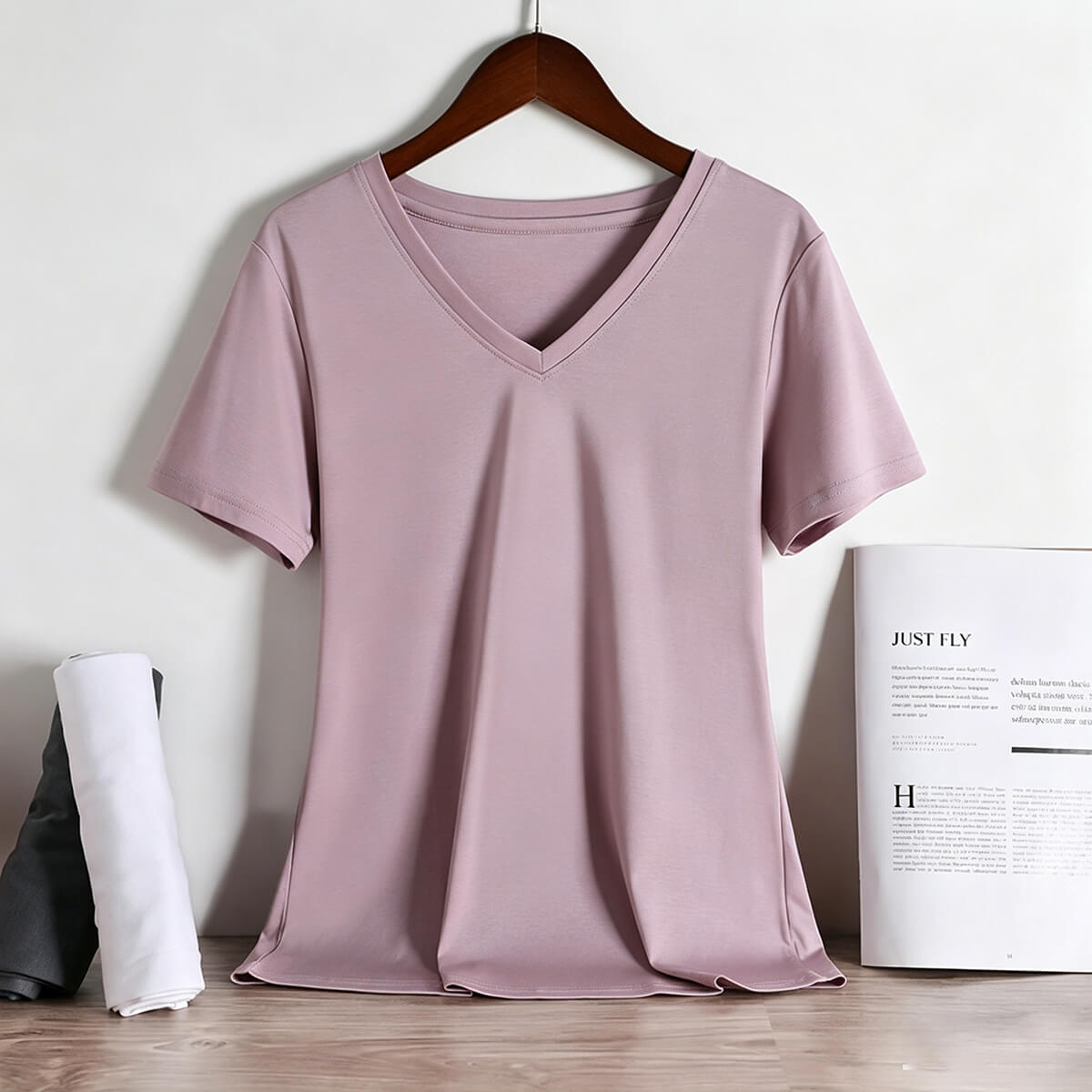 Relaxed fit dusty pink V-neck tee for women, showcasing the smooth and silky texture of 80S long-staple cotton.