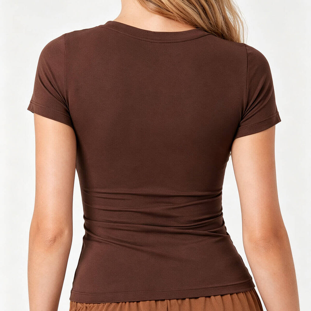 Rear view of a form-fitting espresso brown t-shirt showing the smooth fabric texture and tailored back silhouette.