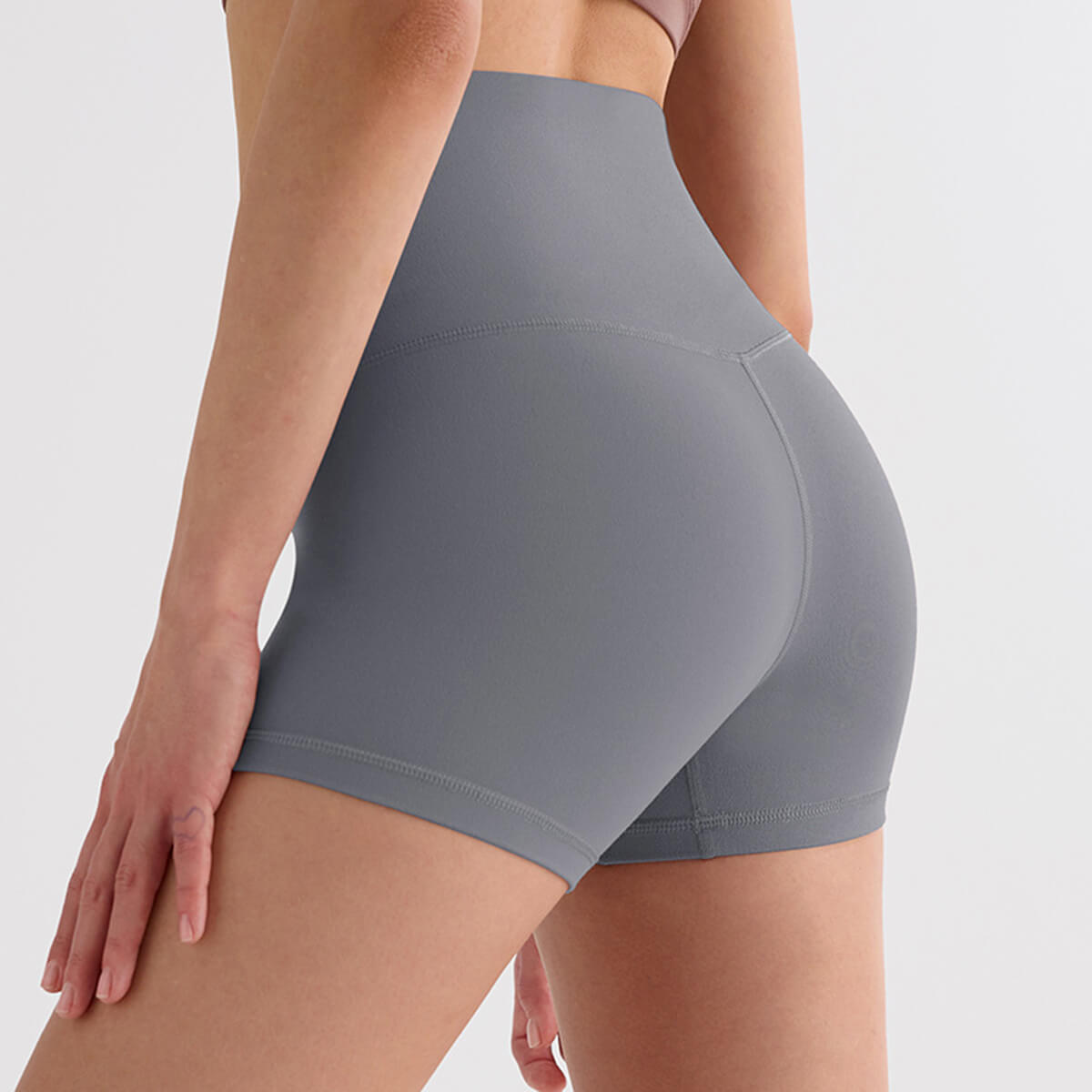 Grey seamless high waisted workout shorts with butt lifting effect.
