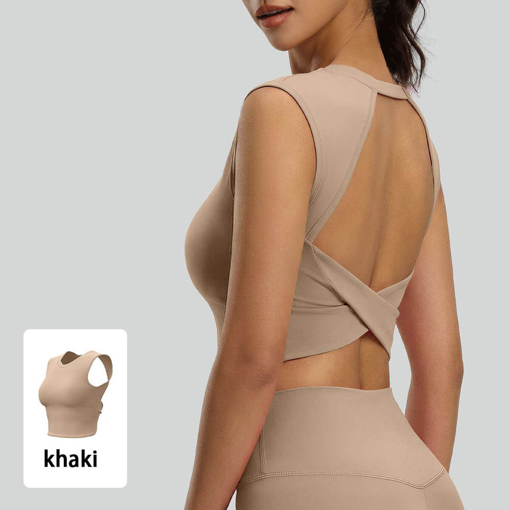 Close-up of a khaki beige open-back workout top with a crossover back design, offering a neutral-toned vintage activewear aesthetic