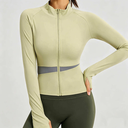 Women's light green slim-fit athletic jacket featuring a full-zip front and unique mesh waist cutout panels for breathability.