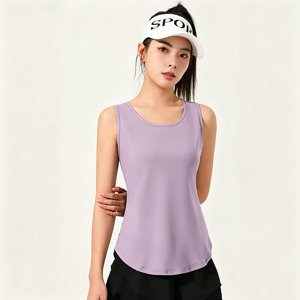 Full length view of a light purple sleeveless yoga top featuring a feminine silhouette and lightweight fabric