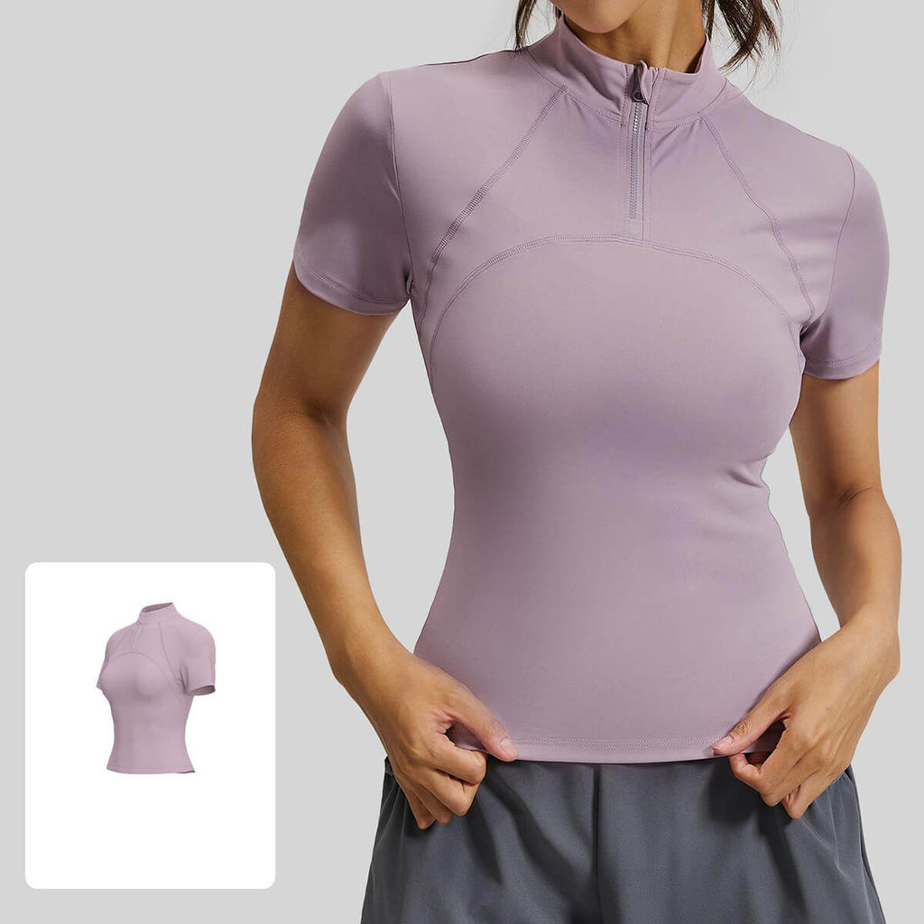 Dusty purple or mauve short sleeve half-zip running shirt for women featuring breathable high-stretch performance fabric.