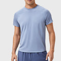 Men's quick dry reflective running t-shirt in light blue with custom logo, OEM activewear manufacturer - front view.