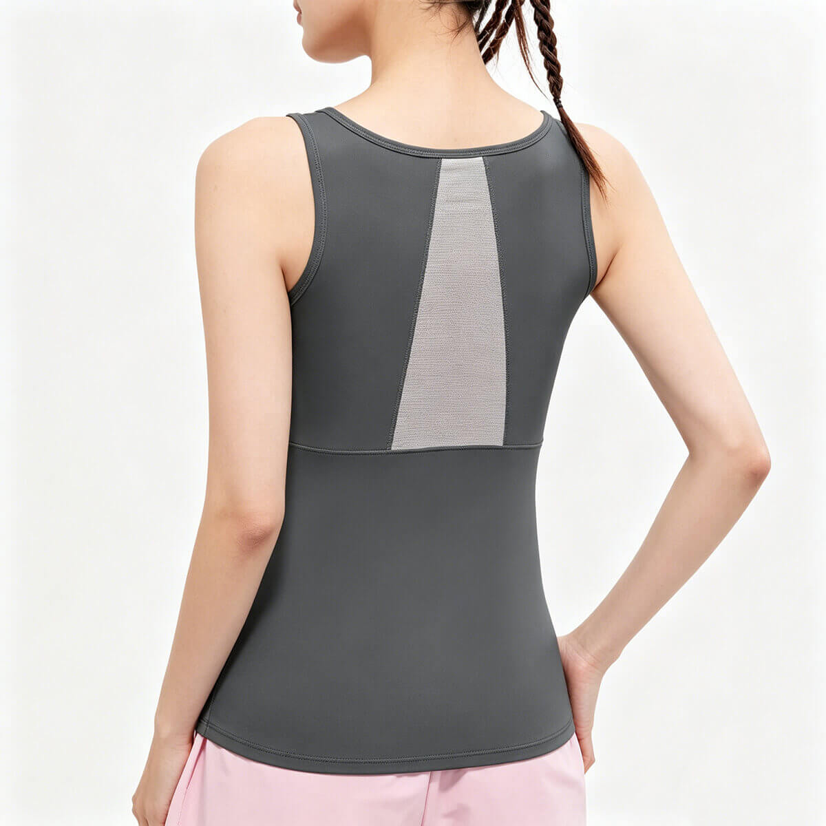 Rear view of a gray racerback yoga tank top highlighting the breathable mesh back panel for extra ventilation during intense workouts