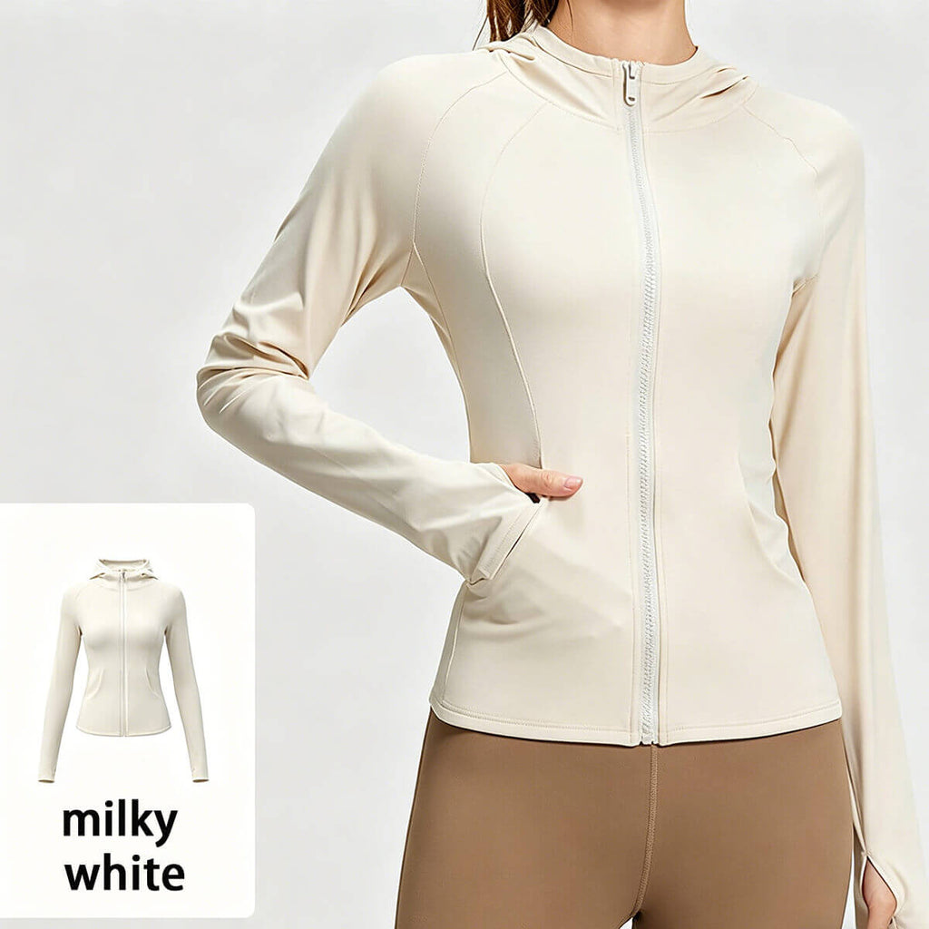 Milky white yoga jacket for women featuring thumbholes and a lightweight, breathable fabric.