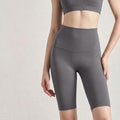 Close-up of slate grey nude-feel yoga shorts with a supportive high-waisted design.