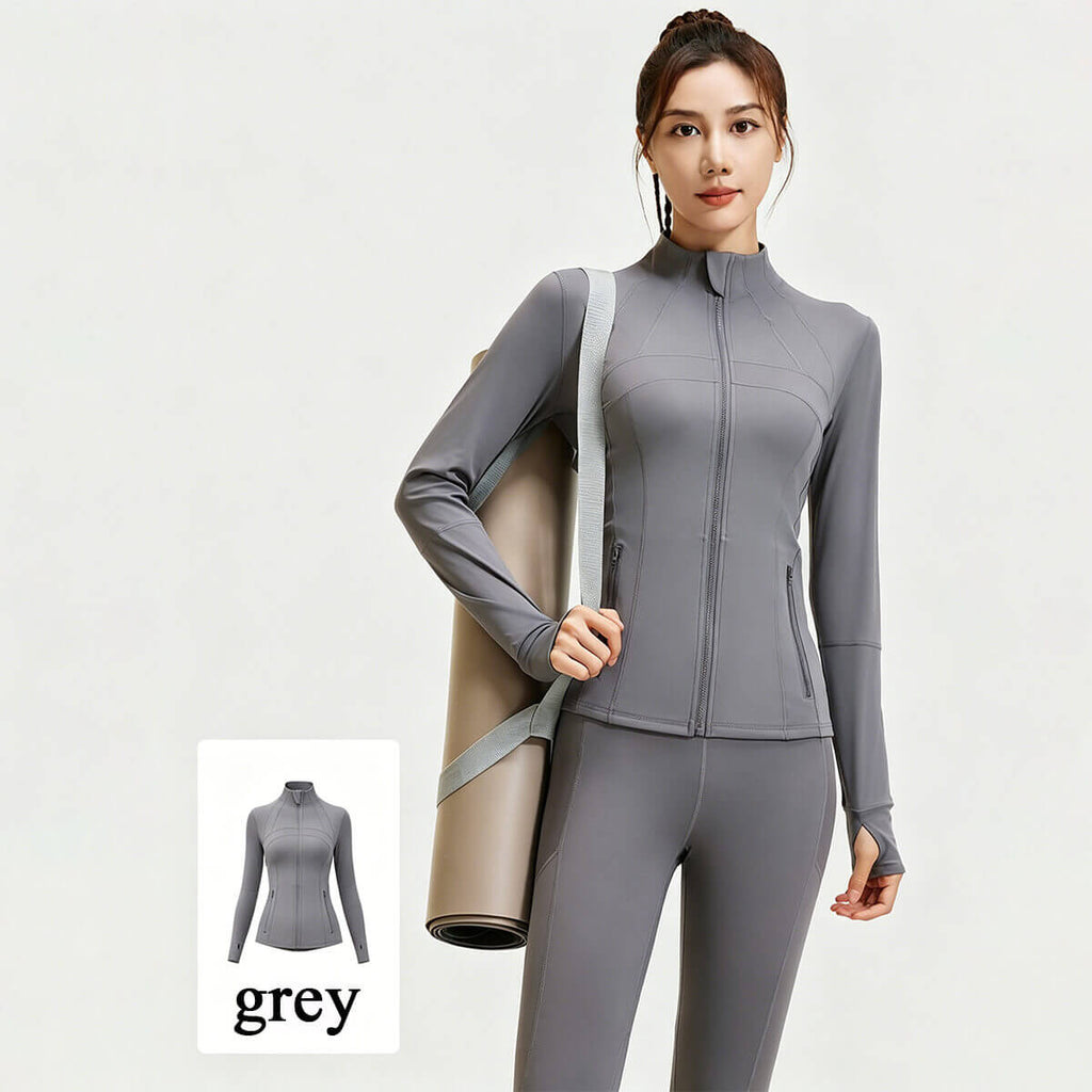 Slate grey performance yoga jacket for women, ideal for gym sessions and outdoor exercise.