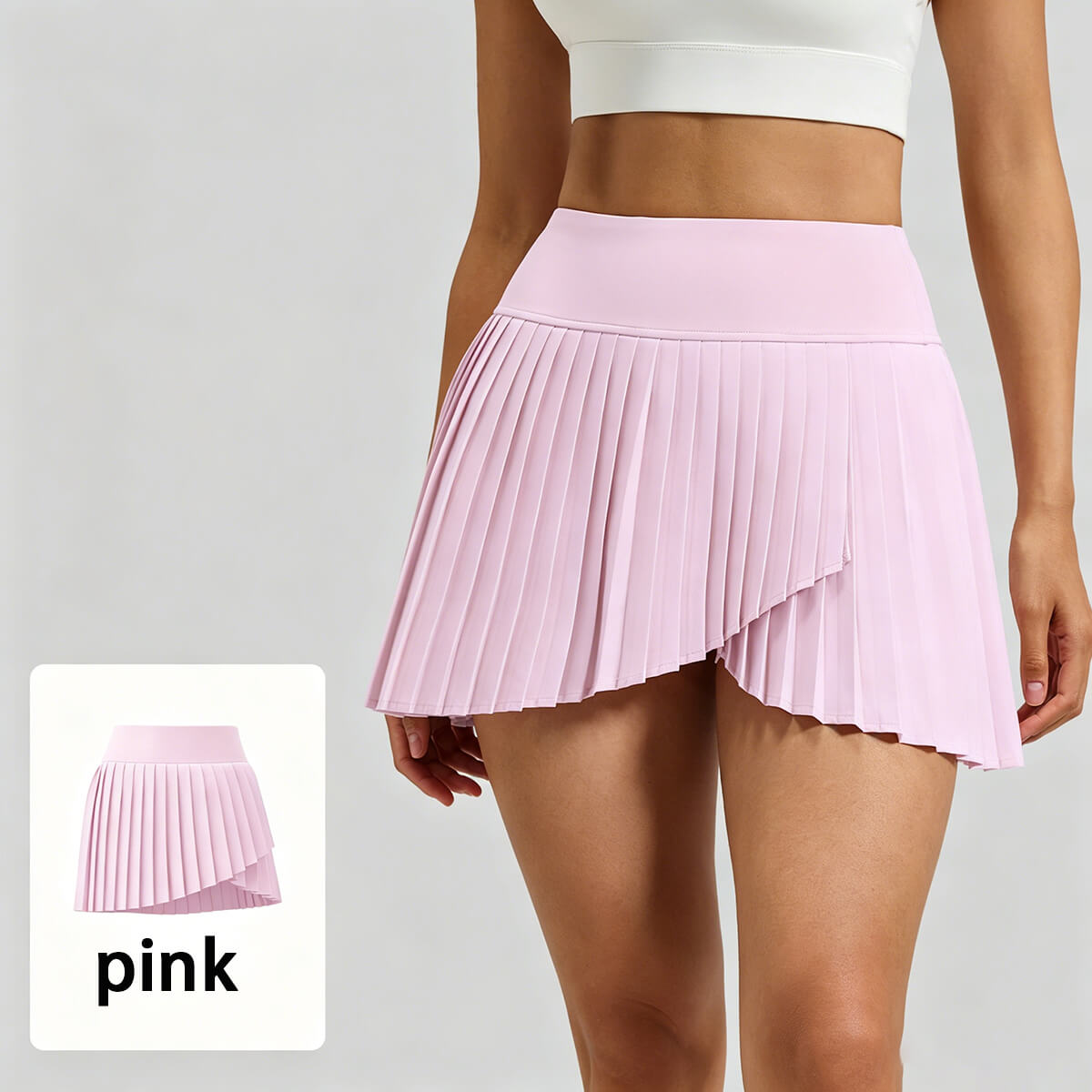 Stylish pink pleated athletic skirt with hidden shorts, a popular retail item for yoga and Pilates studio owners.
