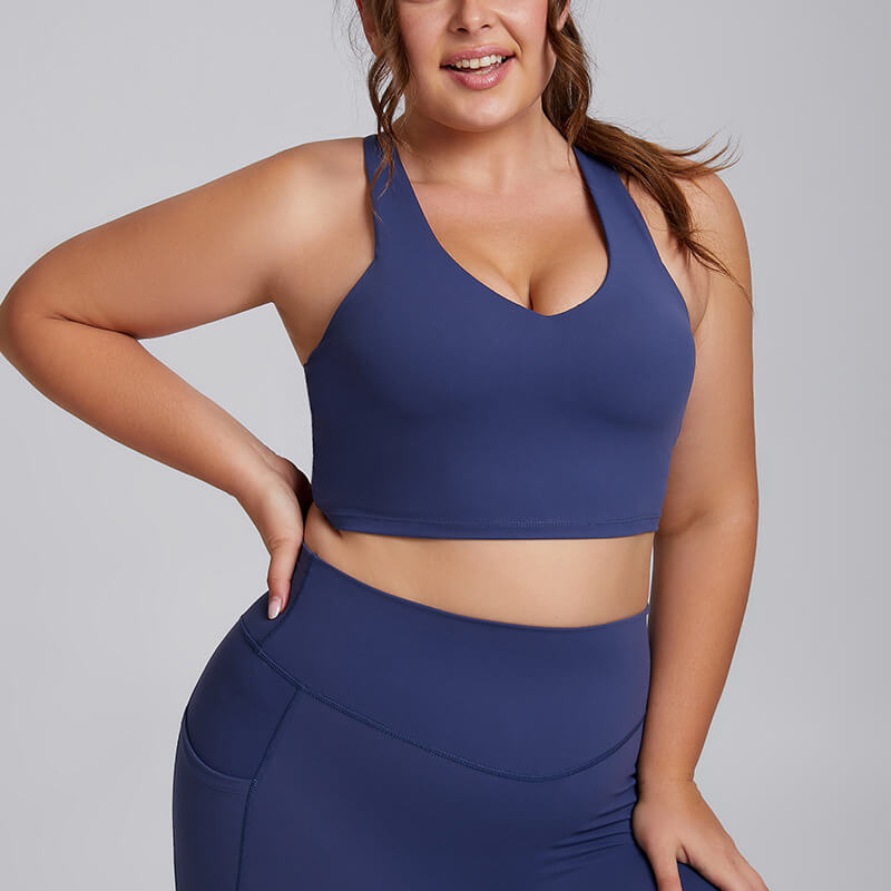 Front view of a plus size slate blue supportive workout sports bra.
