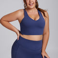 Front view of a plus size slate blue supportive workout sports bra.
