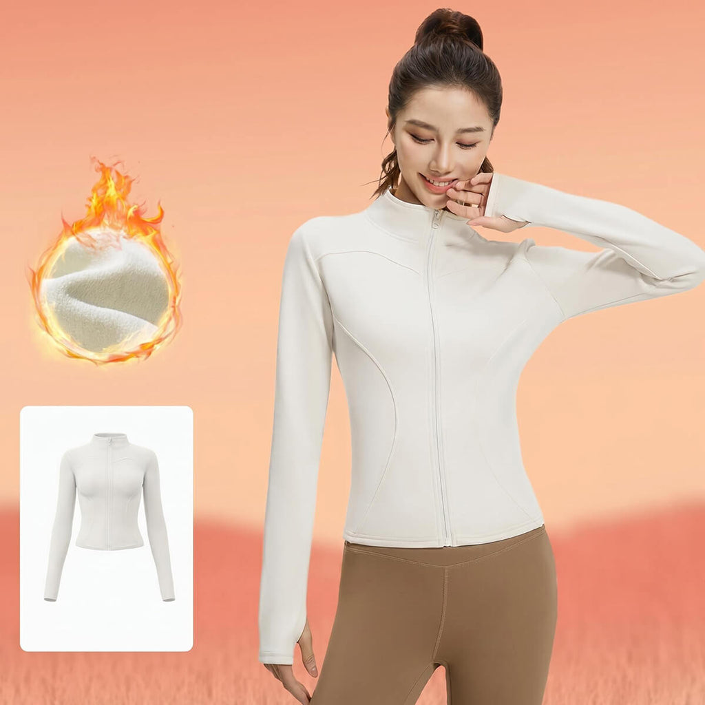 Elegant white fleece-lined full-zip yoga top for women, featuring moisture-wicking thermal fabric and a comfortable mock neck design.