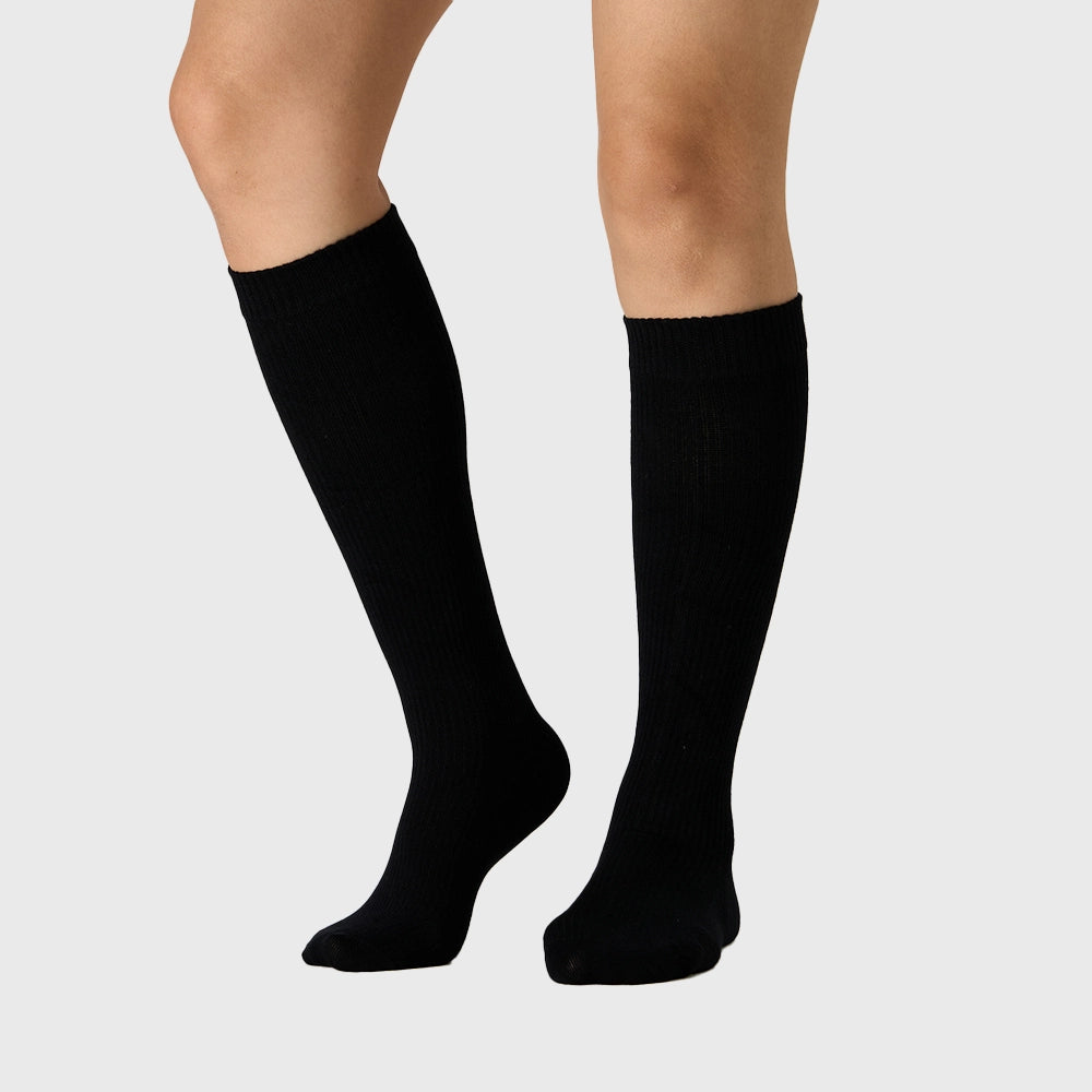 Women's high stretch 15-20 mmHg running compression socks in black with custom logo, athletic apparel manufacturer.