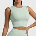 Mint green cap sleeve crewneck workout crop top with custom logo options from private label activewear manufacturer.