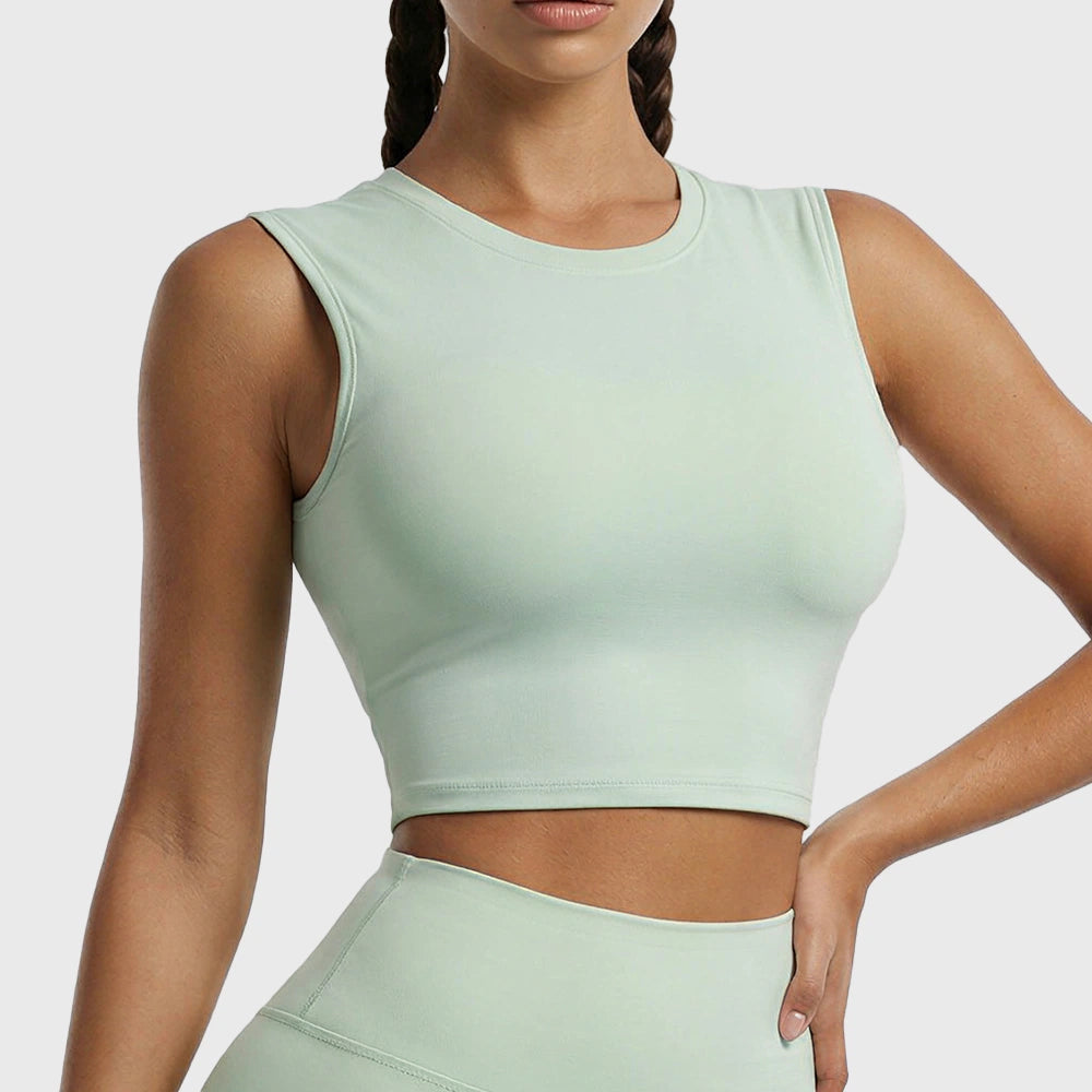 Mint green cap sleeve crewneck workout crop top with custom logo options from private label activewear manufacturer.