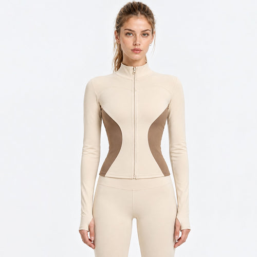 Front view of a women's color-block full-zip athletic jacket in beige and brown, featuring a slim fit and stand collar.