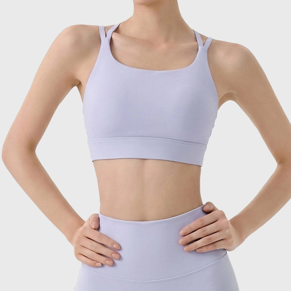 Lilac women's double shoulder strap workout bra with custom logo options from private label sports bra manufacturer.