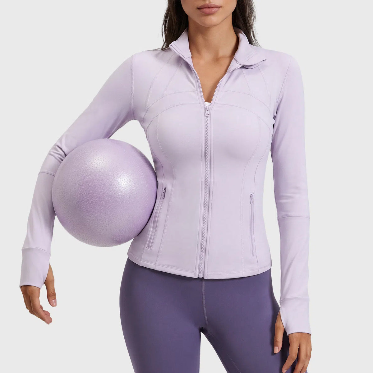 Women's stand collar workout jacket with zipper pockets in lilac with custom logo, custom yoga apparel manufacturer - front view.
