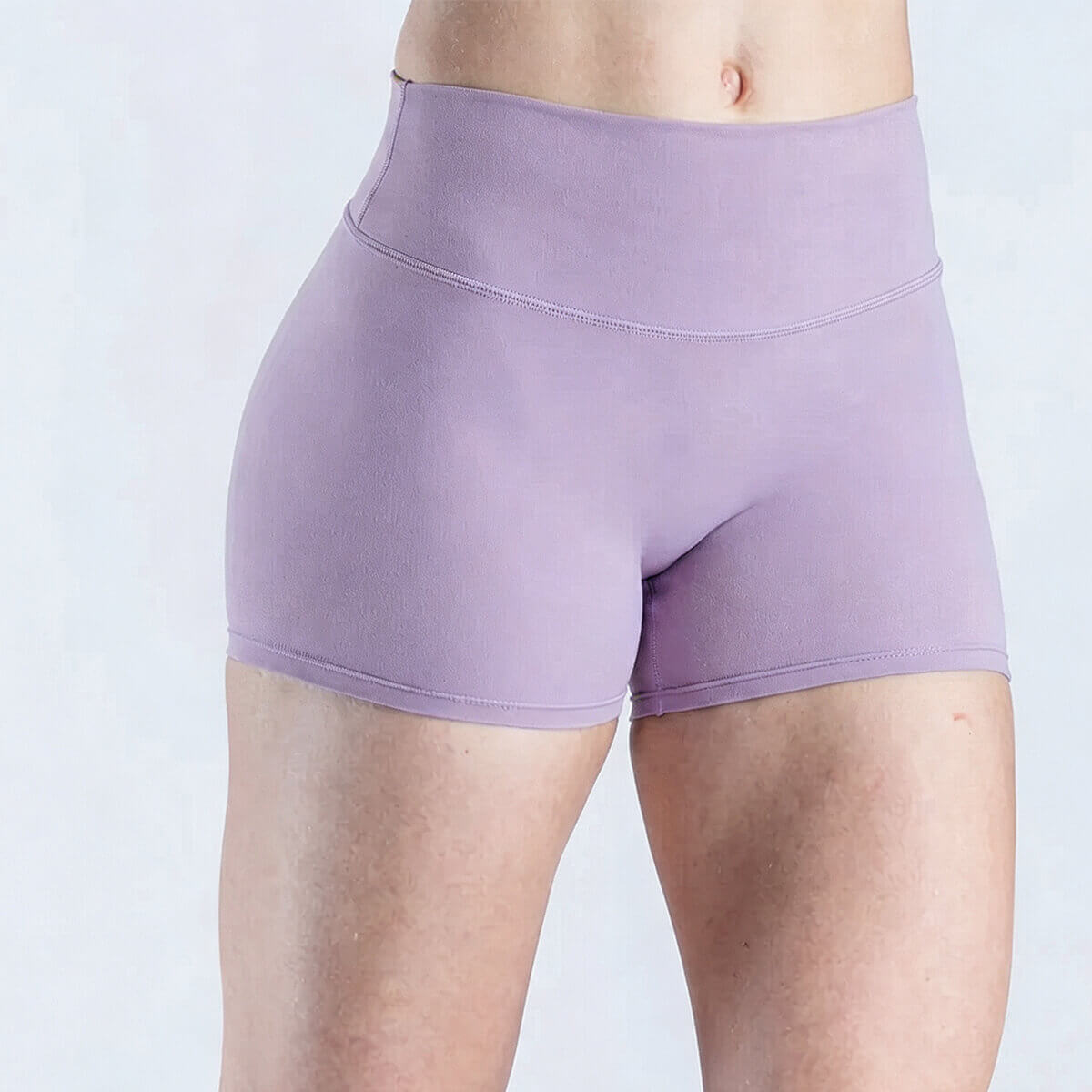 Lilac lavender women's gym shorts featuring a flattering, form-fitting silhouette for yoga or Pilates.