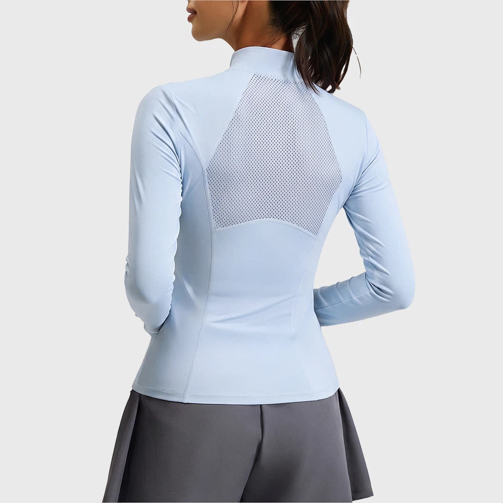 Back view showing breathable mesh ventilation panel on women's athletic top in ice blue with custom logo, OEM gym wear manufacturer.