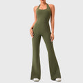 Women's halter neck split flare leg yoga jumpsuit in olive green with custom logo, direct clothing manufacturer - front view.