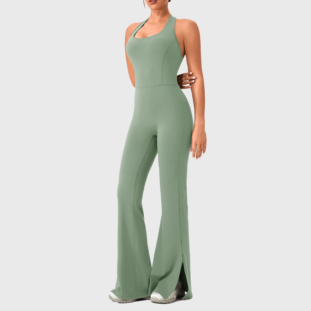 Women's halter backless split flare yoga jumpsuit in sage green with custom logo, OEM activewear manufacturer - front view.