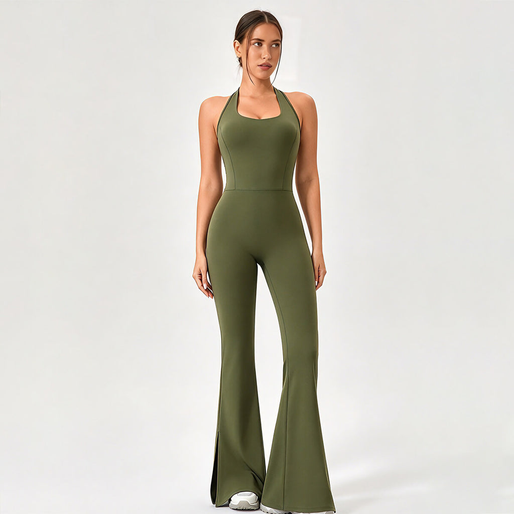 Front view of an olive green halter-neck flare leg yoga jumpsuit with slit hems.