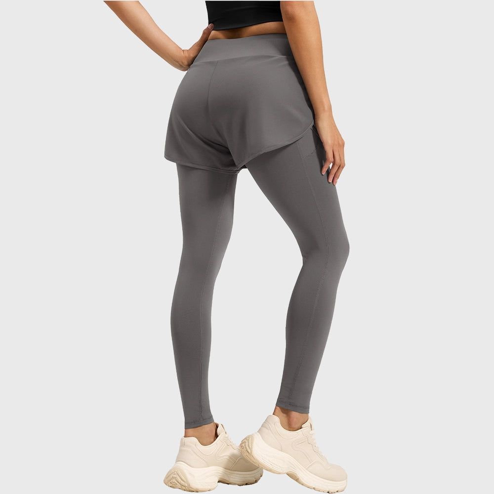 Back view of women's 2-in-1 layered workout leggings with shorts in slate grey with custom logo, private label manufacturer.