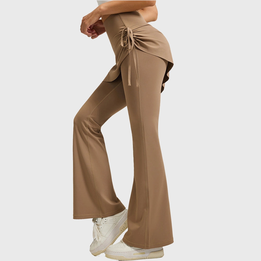 Side view of women's 2-in-1 skirted flare workout pants in khaki with custom logo, direct clothing manufacturer.
