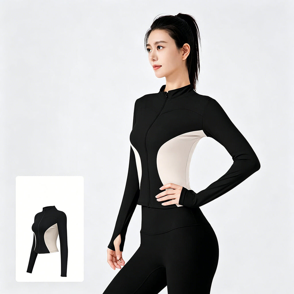 Stylish black and white color-block fitness jacket for women, designed as premium athleisure wear for running and training.
