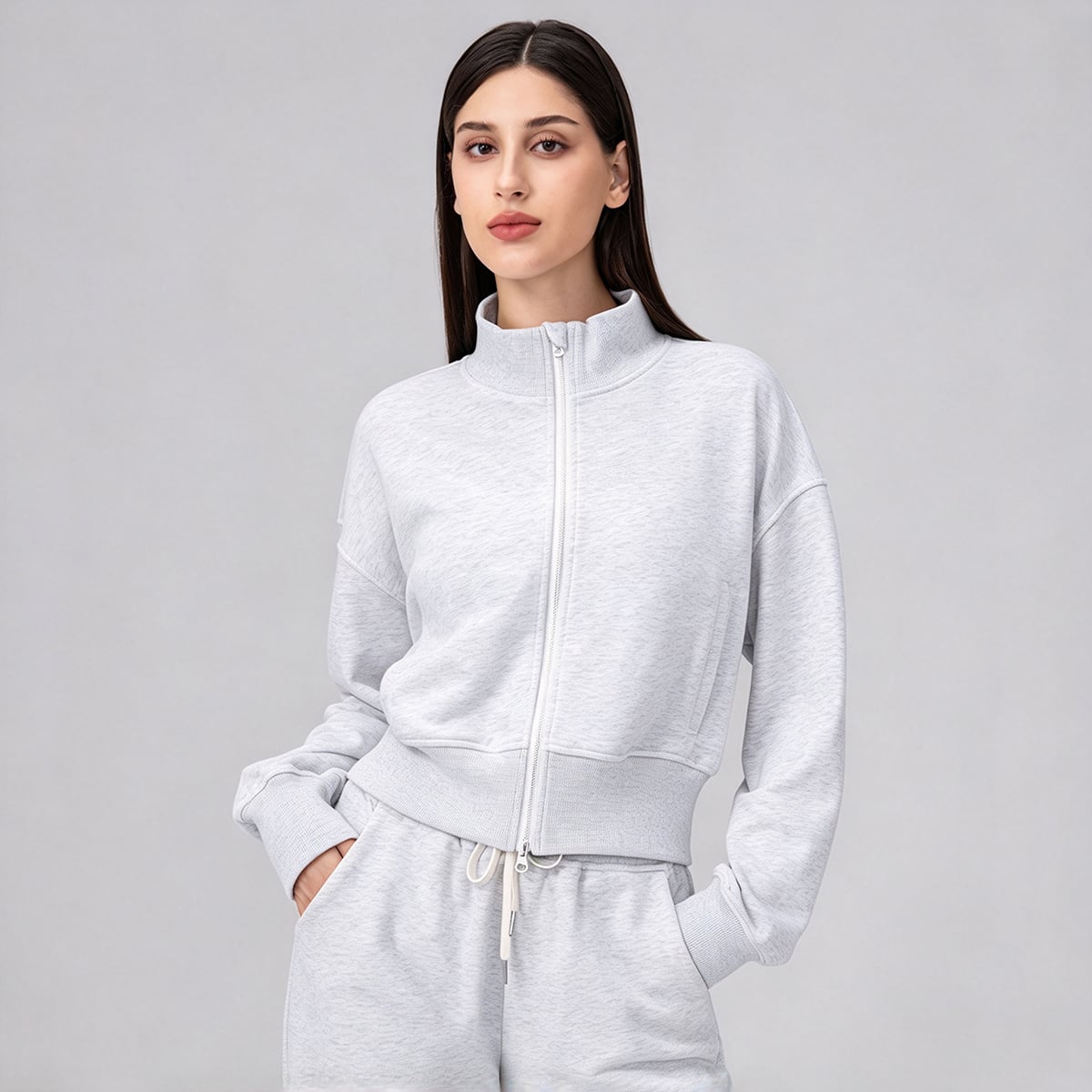 Front view of a heather grey oversized cropped full-zip scuba jacket.