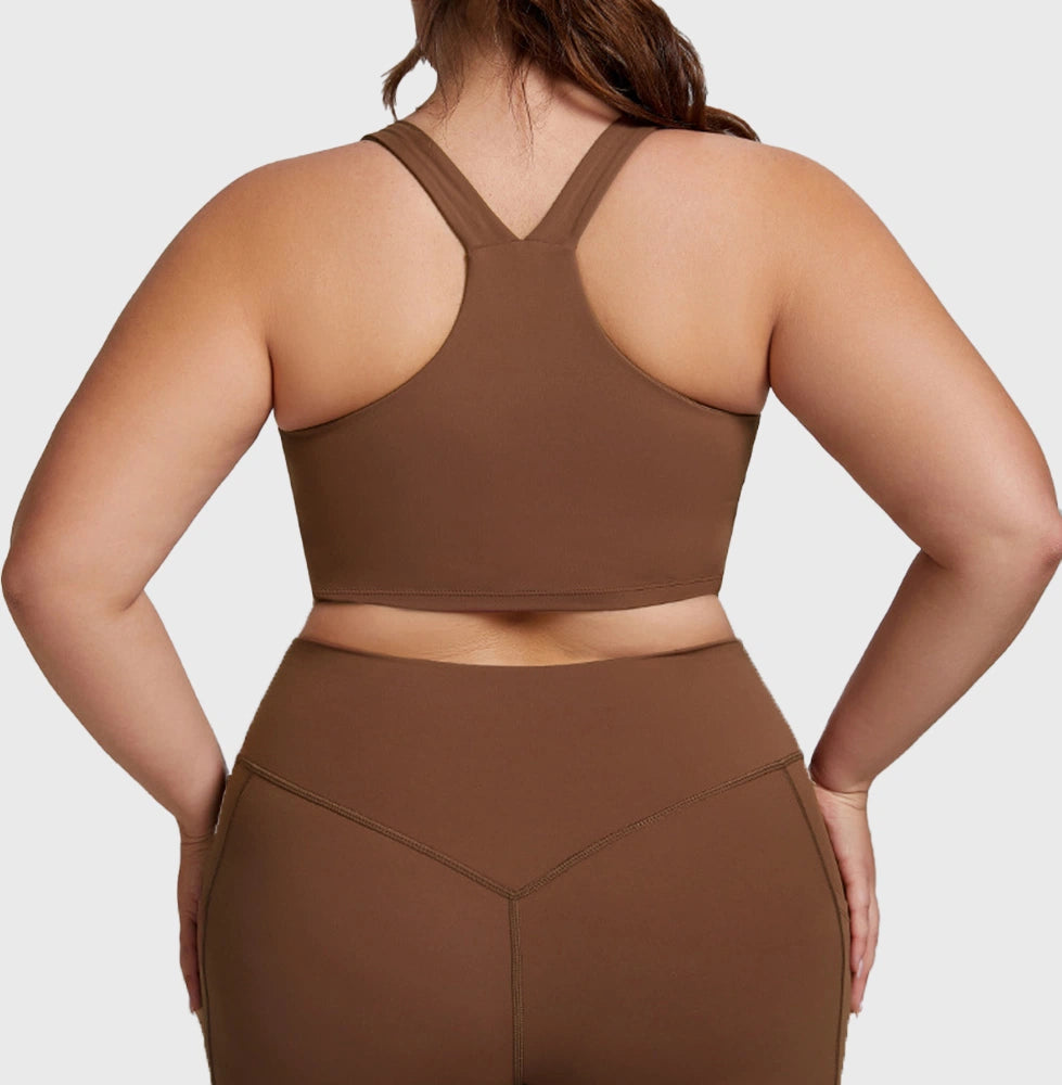 Back racerback design and full support band of plus size athletic bra with custom logo, manufactured by sports apparel manufacturer.