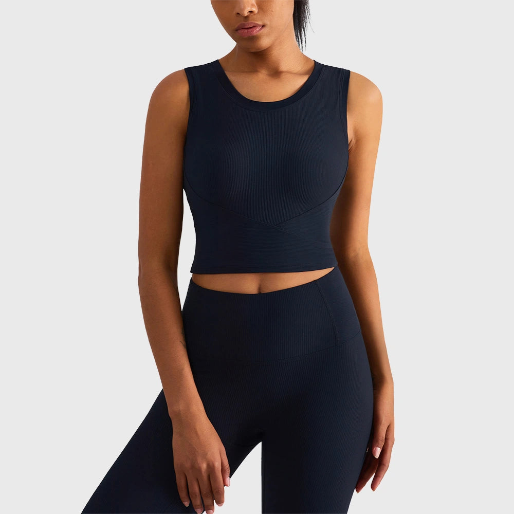 Black women's ribbed athletic sleeveless crop top with custom logo, supplied by fitness apparel manufacturer.