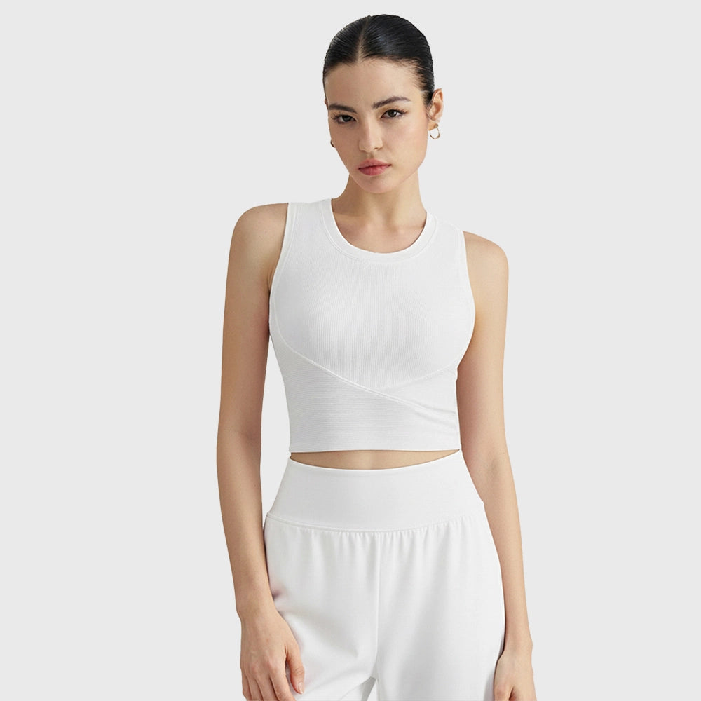 White women's ribbed crewneck sleeveless crop top with custom logo placement, crafted by sportswear manufacturer.