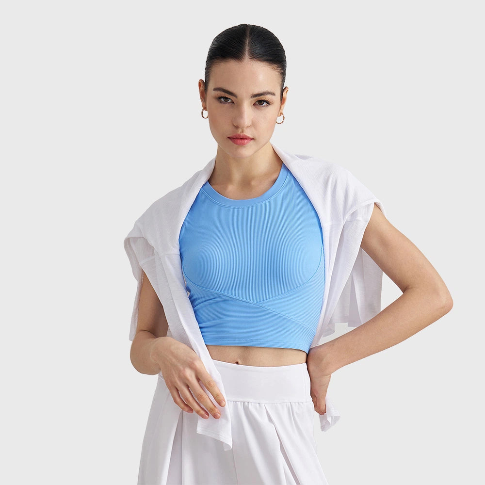 Styling view of women's sky blue ribbed racerback crop top with custom logo service, direct from OEM garment manufacturer.