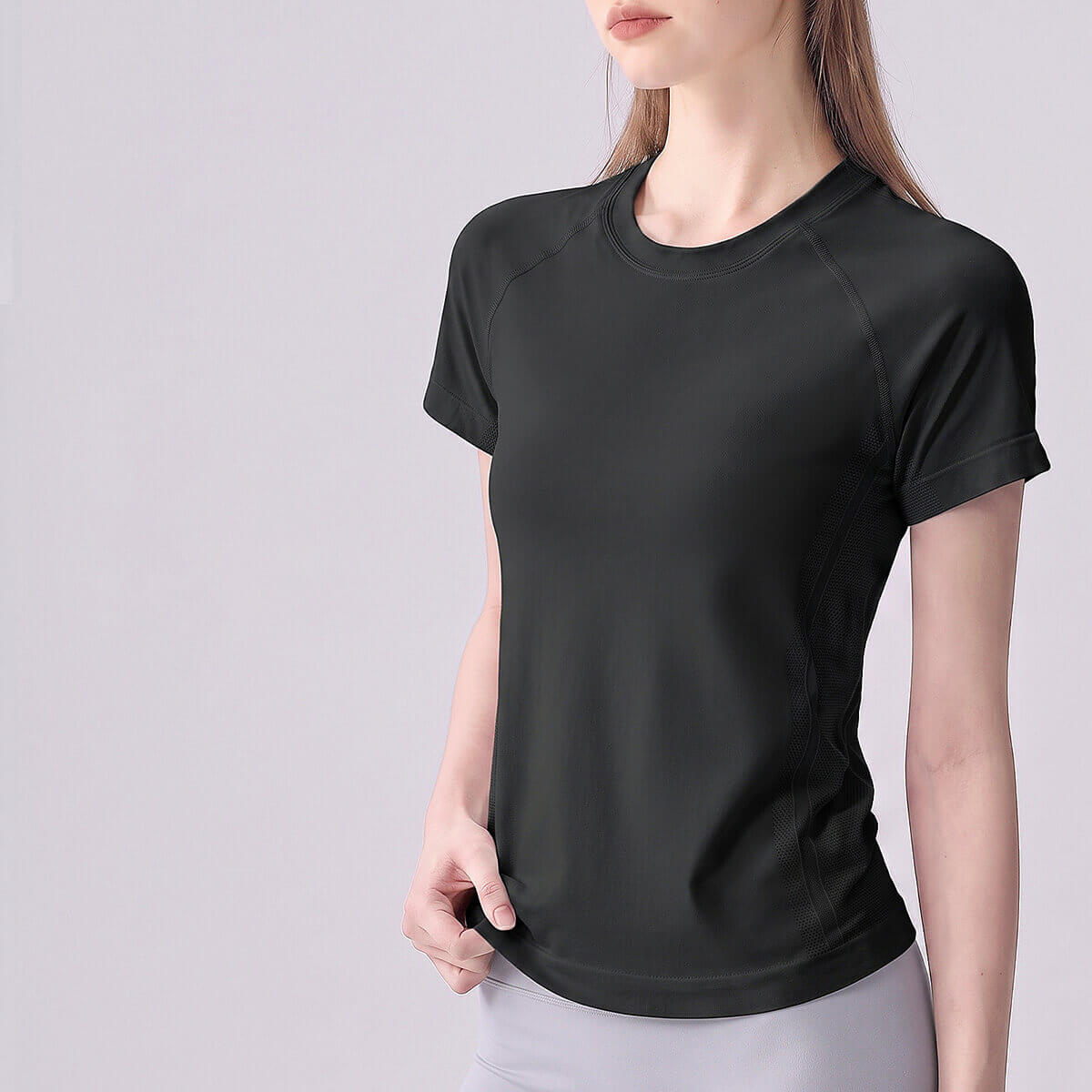 Front view of a classic black seamless short sleeve workout top.