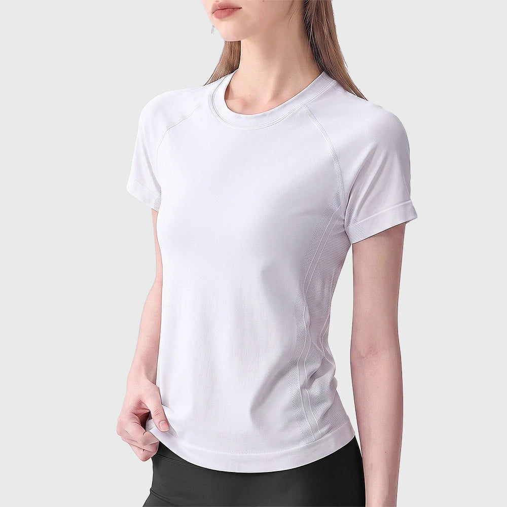 White women's quick dry seamless sports t-shirt with custom logo placement, crafted by professional sportswear manufacturer.