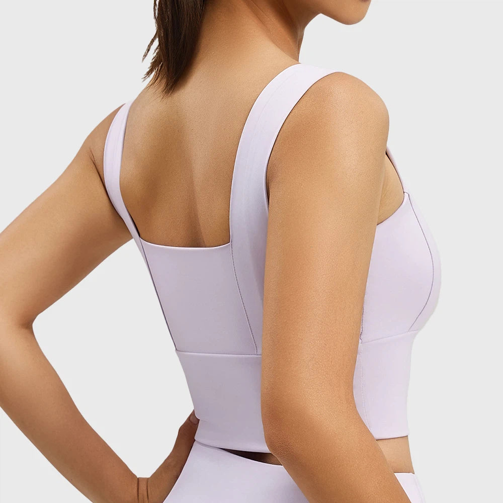 Back view of women's low square back longline athletic bra in lilac with custom logo, sportswear manufacturer.
