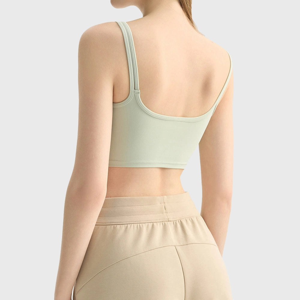 Back view of women's square neck low back longline sports bra in light sage with custom logo, OEM activewear manufacturer.