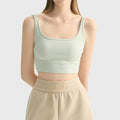 Women's square neck longline sports bra in light sage with custom logo, custom yoga apparel manufacturer.