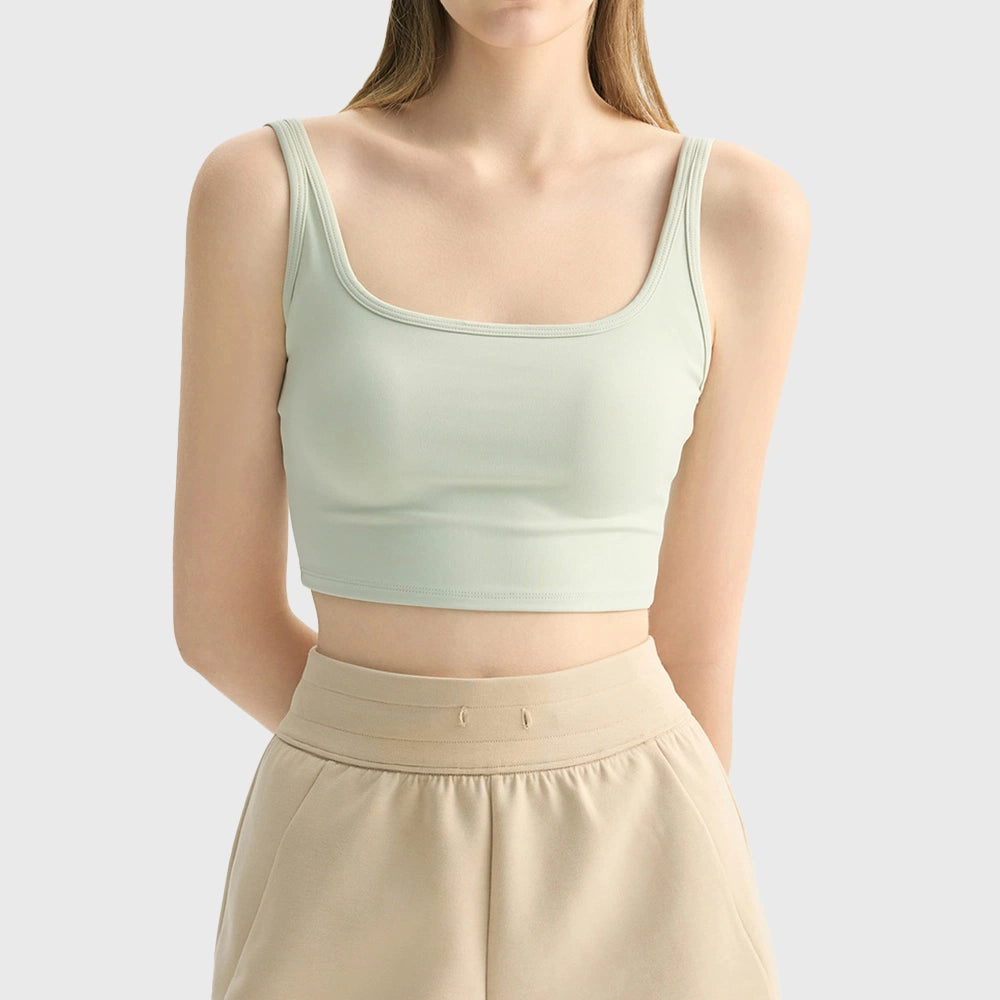 Women's square neck longline sports bra in light sage with custom logo, custom yoga apparel manufacturer.